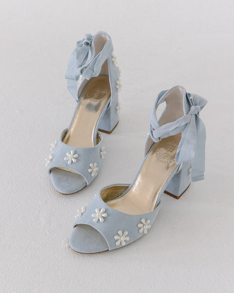 Blue pearl flower wedding shoes for the bride on her wedding day
