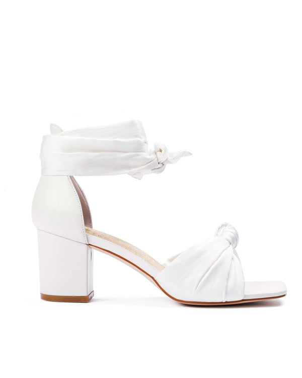 Low heel ivory wedding shoes with bow