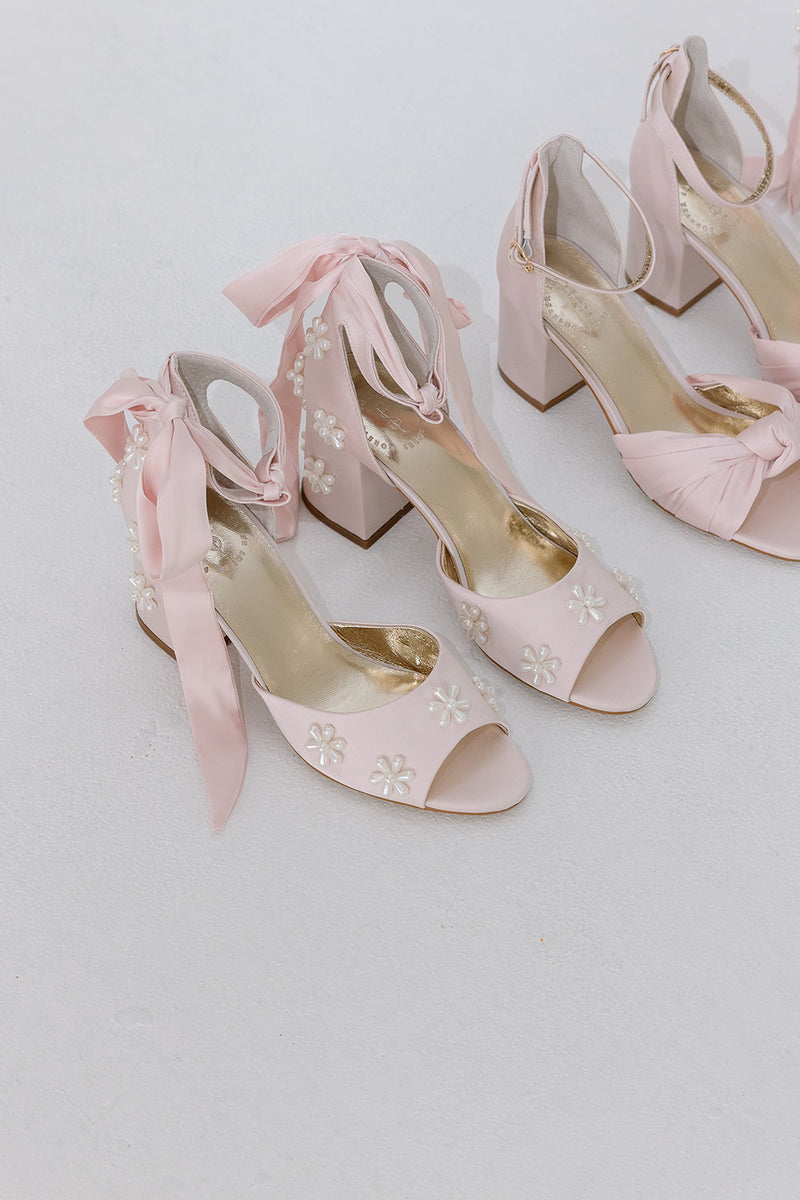 Pink satin bridal shoes with pearl daisy flowers