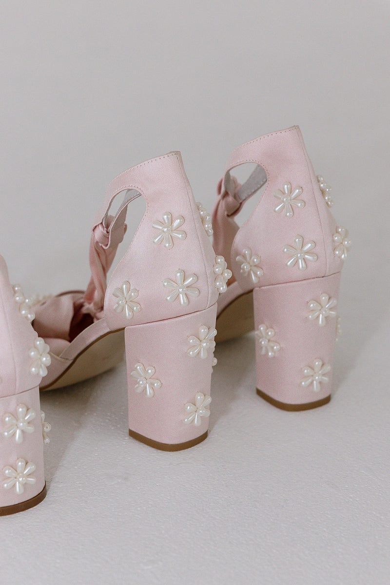 Pink satin bridal shoes with pearl daisies