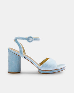 Light blue velvet high-heeled sandal on a white background