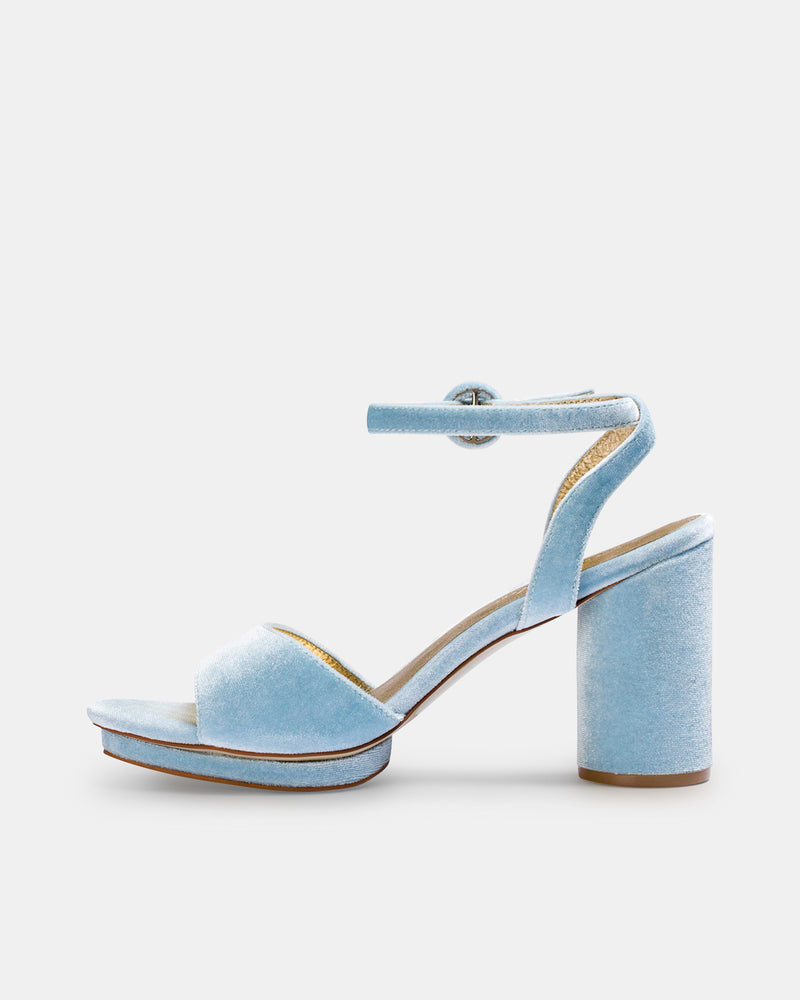 Light blue velvet high-heeled sandal on a white background