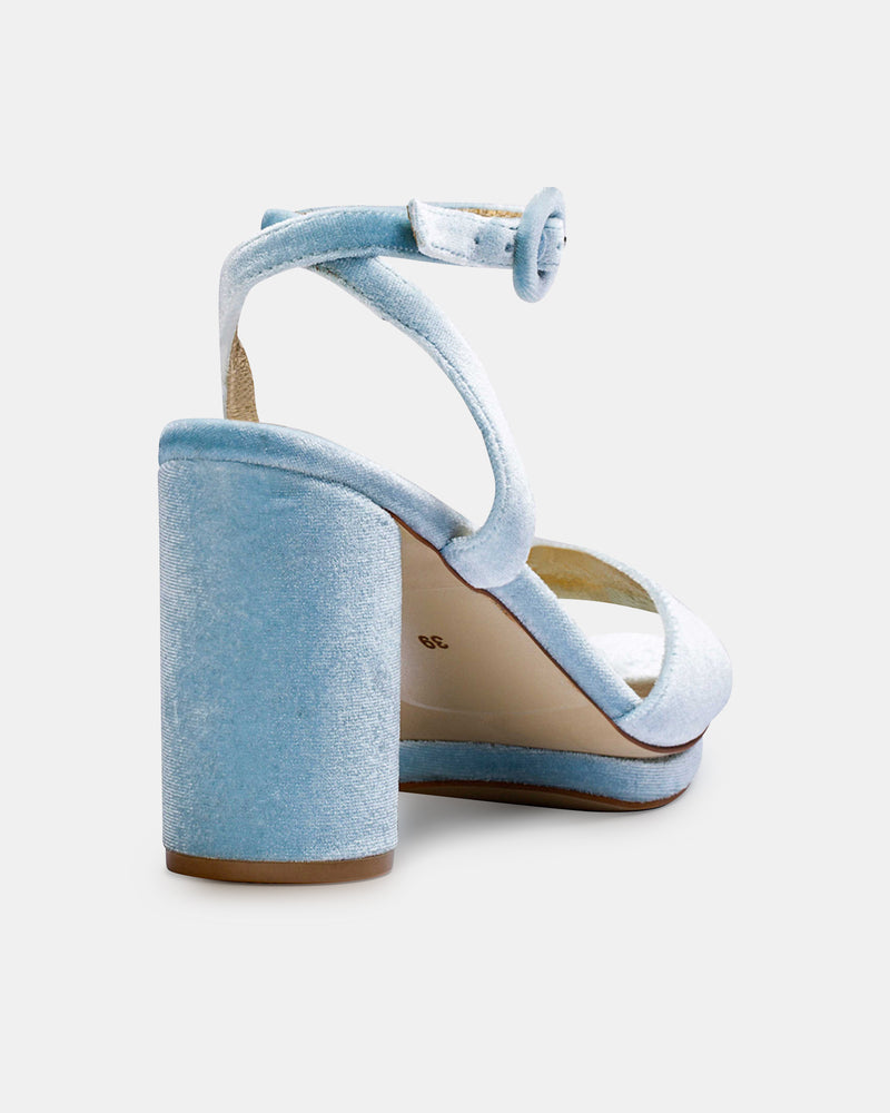 Light blue velvet high-heeled sandal on a white background