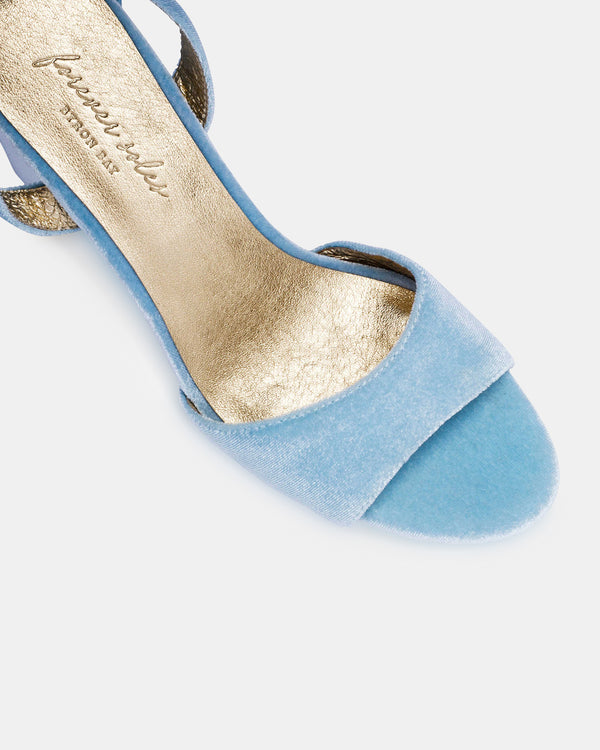 Light blue velvet high-heeled sandal on a white background