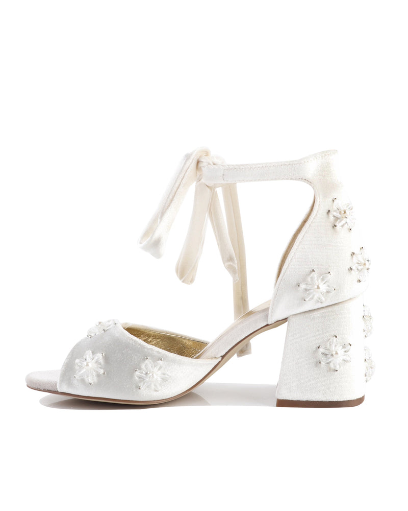 White velvet bridal shoes with pearl flowers