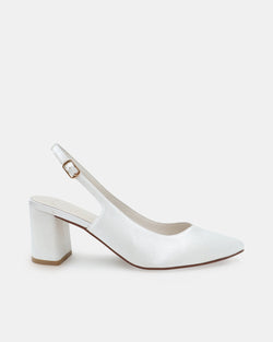 White high-heeled closed toe shoe on a white background