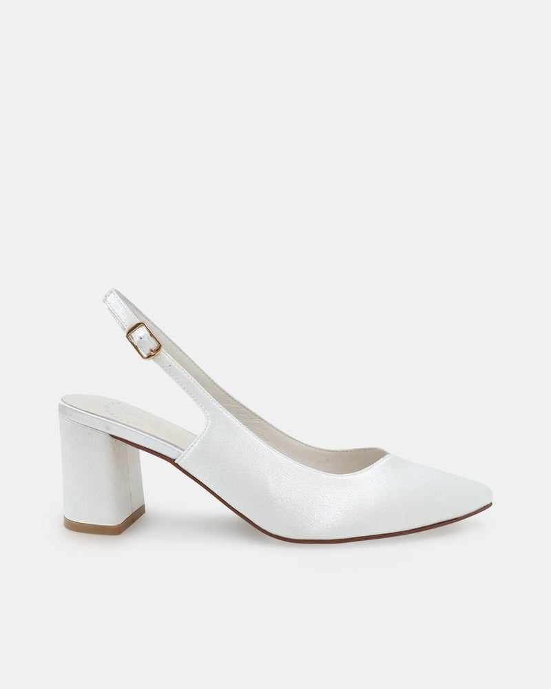 White high-heeled closed toe shoe on a white background