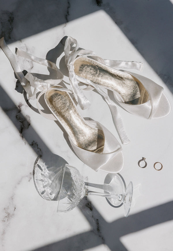 White low heel satin bridal shoes. Grace