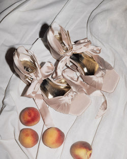 Nude satin bridal shoes with bow