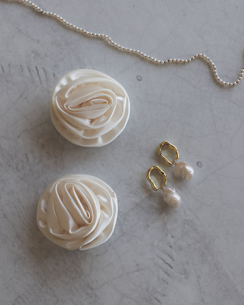 Ivory satin clip on rosette flowers