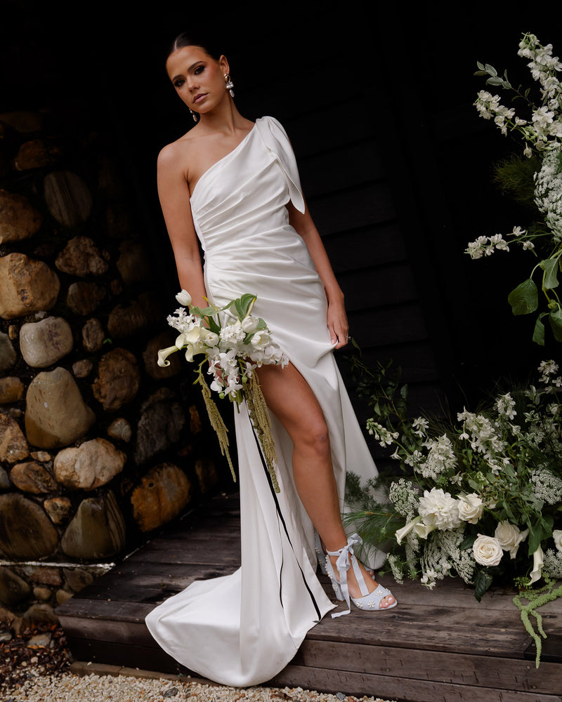 Blue pearl bridal shoes worn by bride on wedding day