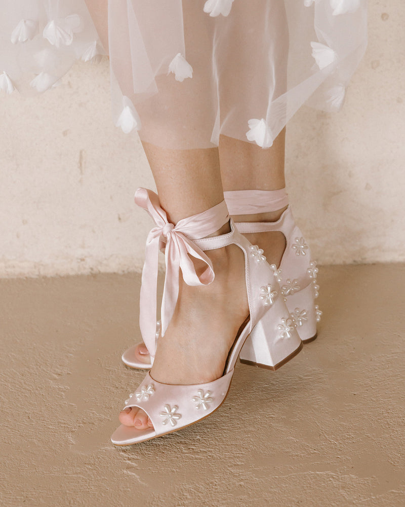 Pink satin bridal shoes with pearl daisy flowers