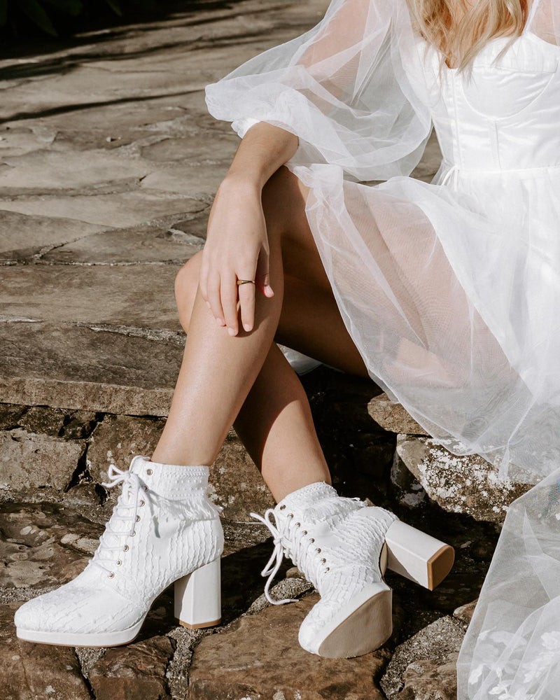 Lace up bohemian bridal boots with ivory lace and gold details