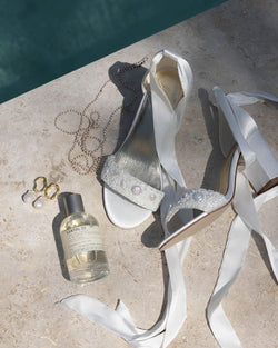 White satin embellished bridal shoes with ribbon ties