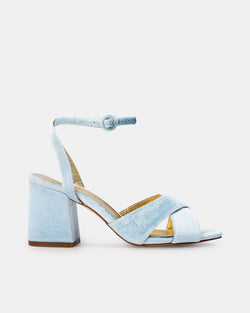 Light blue sandal with a block heel on a white background