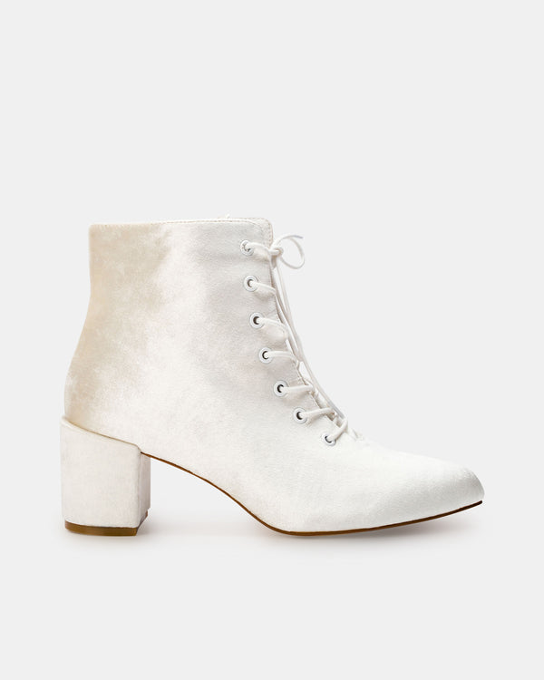White velvet lace-up ankle boot on a white background