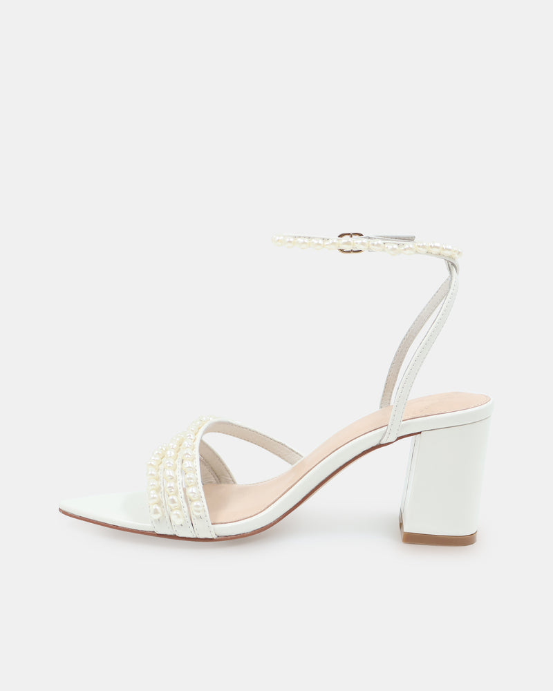 White sandal with block heel on a white background