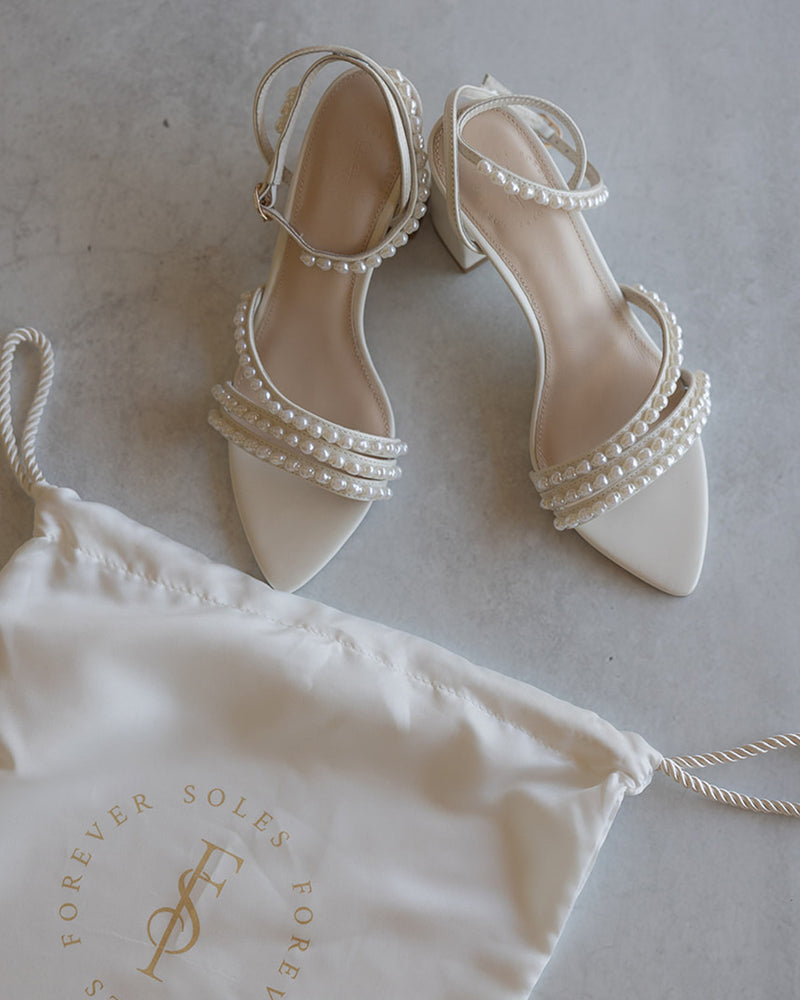 Ivory sandal with block heel and ankle strap