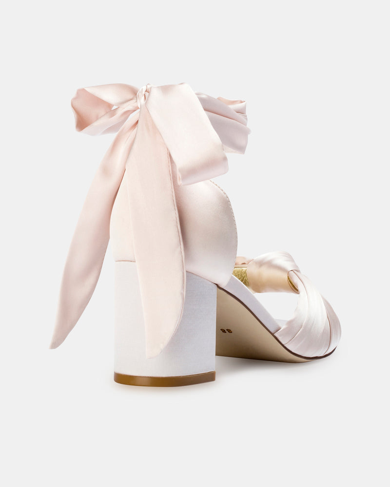 Pink satin bridal shoes with bow ties