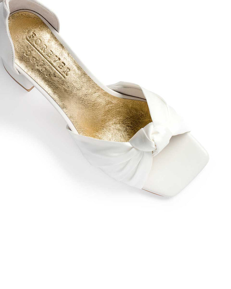 Ivory square toe bridal shoe with bow tie front