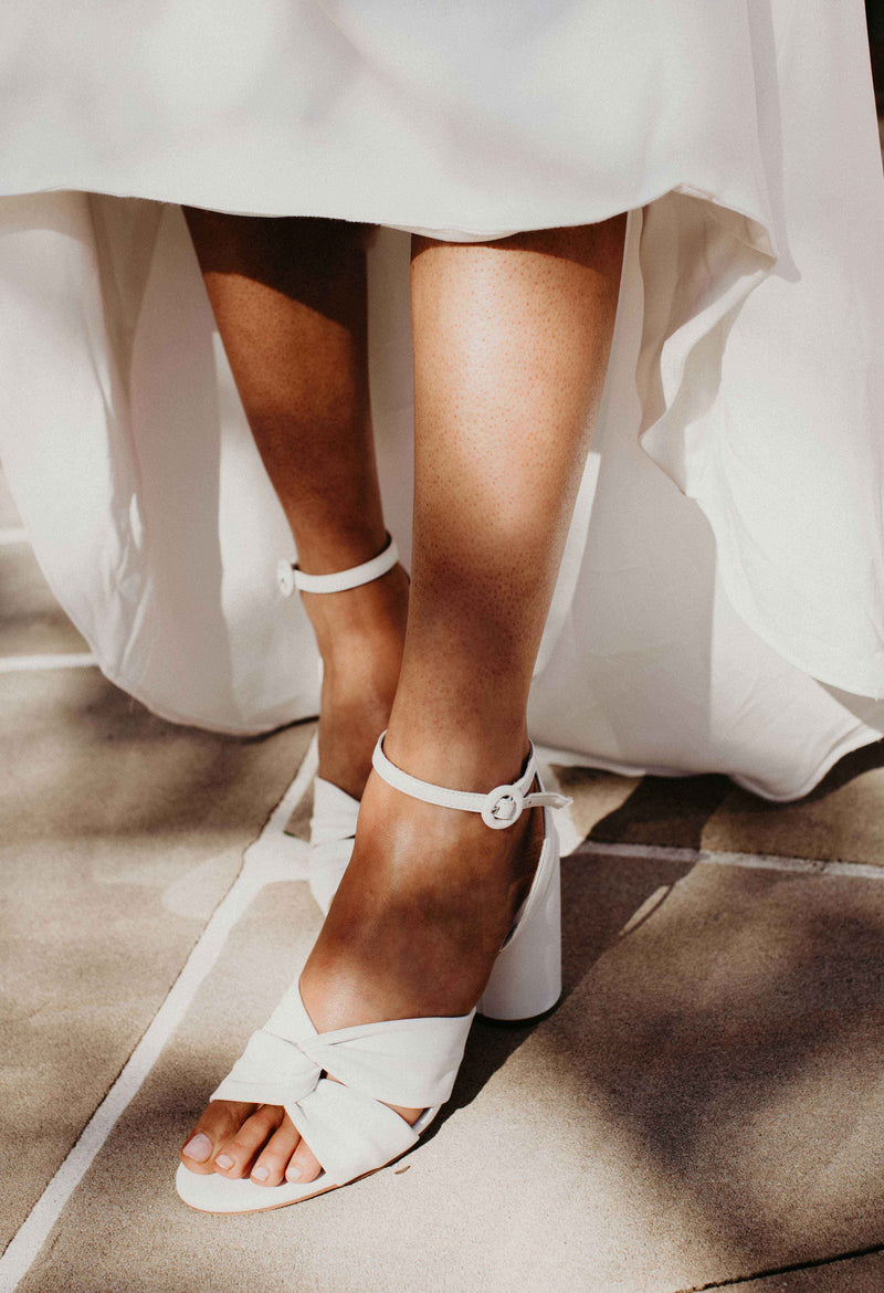 Ivory bridal shoes with cross front