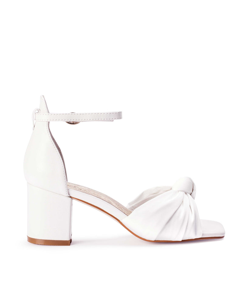 Ivory square toe bridal shoe with bow tie front